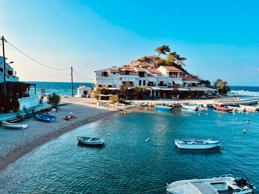 Boats in a serene coastal village harbor